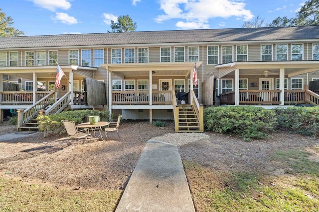 view of front of property featuring stairs