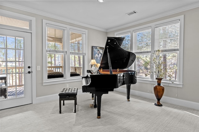 misc room with ornamental molding, plenty of natural light, and carpet flooring