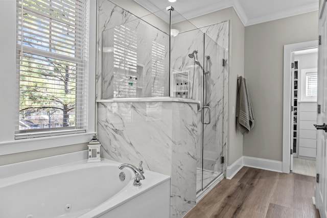 bathroom with ornamental molding, plus walk in shower, and wood-type flooring