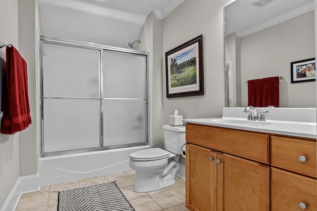 full bathroom with combined bath / shower with glass door, tile patterned flooring, vanity, ornamental molding, and toilet