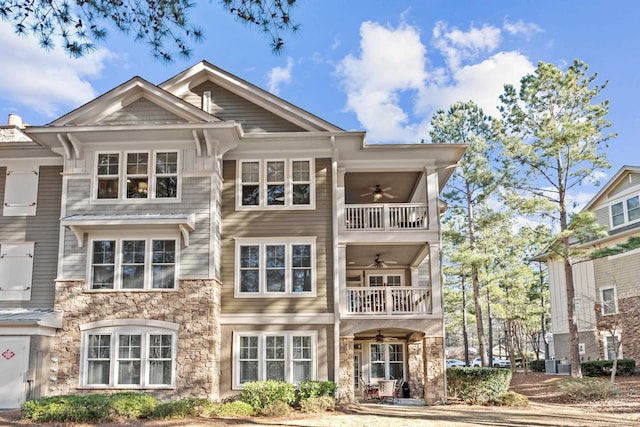 view of front of house with ceiling fan