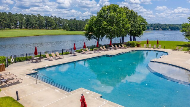112 Arbors Ln, Eatonton, GA 31024 - community pool with a yard, a patio area, a water view, and fence