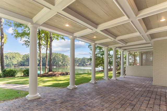 view of patio featuring a water view