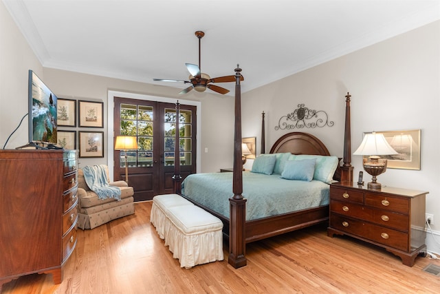 bedroom featuring light hardwood / wood-style flooring, access to exterior, ceiling fan, crown molding, and french doors