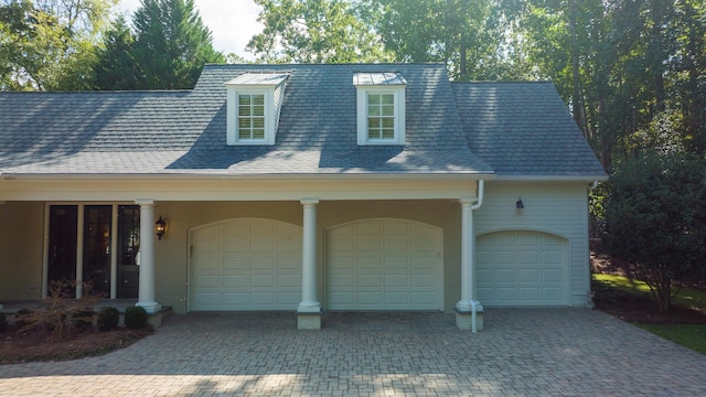 exterior space with a garage