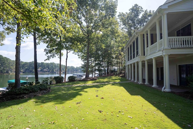 view of yard with a water view