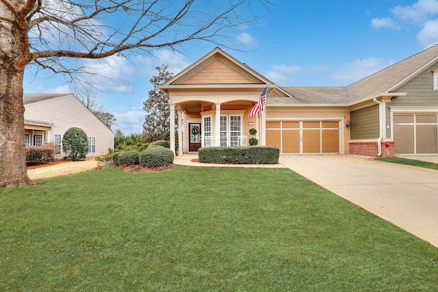 view of front facade featuring a garage and a front yard