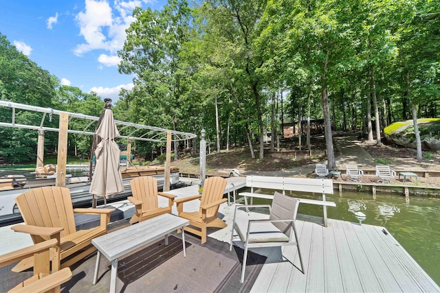 114 Oak Ridge Ln, Eatonton, GA 31024 - dock featuring view of scattered trees and a water view