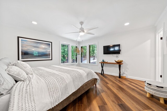 114 Oak Ridge Ln, Eatonton, GA 31024 - bedroom with ornamental molding, wood finished floors, recessed lighting, baseboards, and ceiling fan