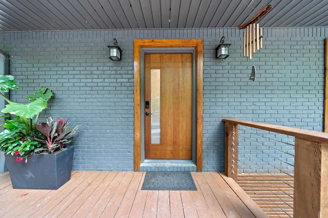 114 Oak Ridge Ln, Eatonton, GA 31024 - doorway to property featuring brick siding