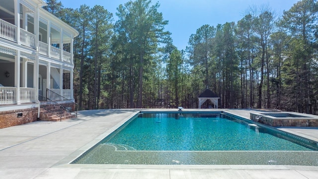 1011 Dogwood Dr, Greensboro, GA 30642 - view of pool featuring a patio and a pool with connected hot tub