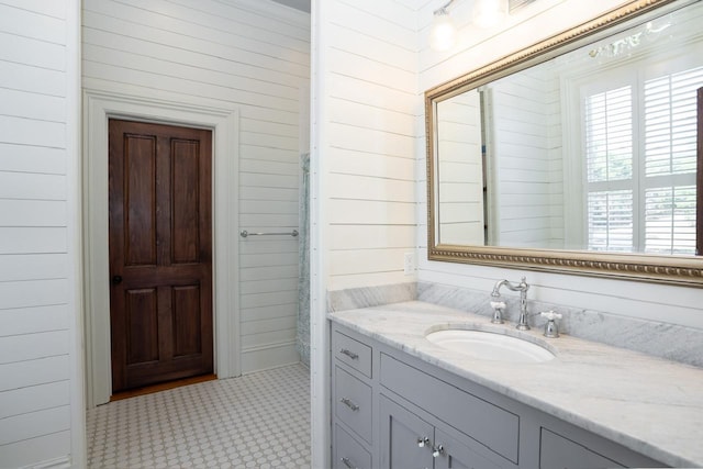 1011 Dogwood Dr, Greensboro, GA 30642 - bathroom with wooden walls and vanity