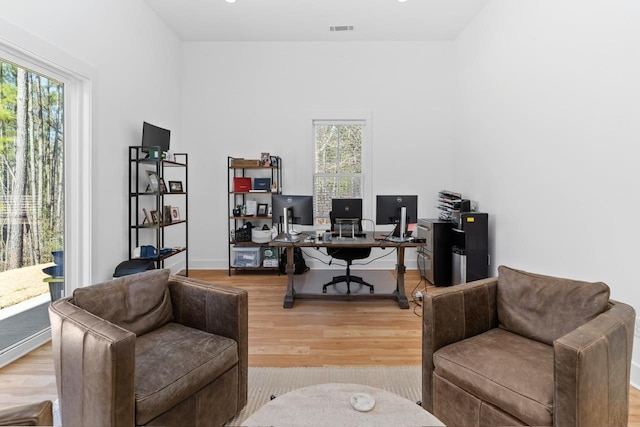 1011 Dogwood Dr, Greensboro, GA 30642 - office area featuring plenty of natural light, visible vents, baseboards, and wood finished floors