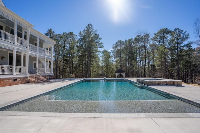 1011 Dogwood Dr, Greensboro, GA 30642 - view of pool with a patio and a pool with connected hot tub