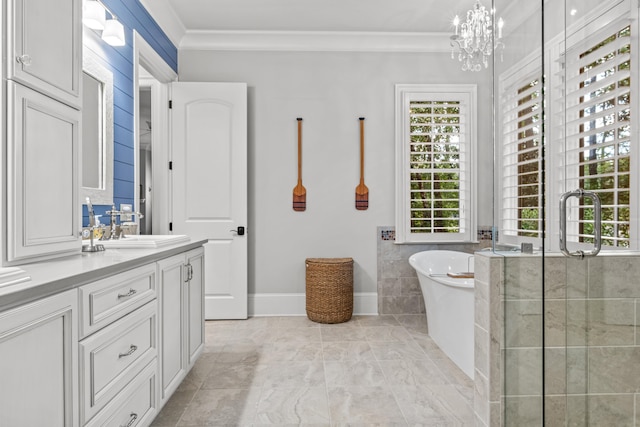 bathroom featuring an inviting chandelier, ornamental molding, shower with separate bathtub, and vanity