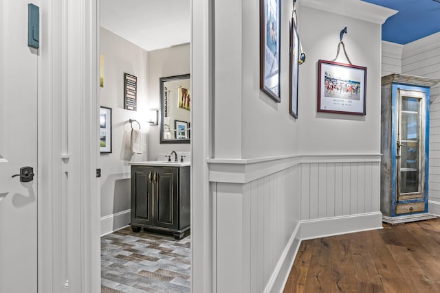 interior space with hardwood / wood-style flooring and sink