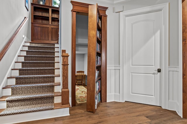 stairs with wood-type flooring