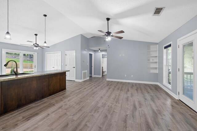 348 Bluegill Rd, Eatonton, GA 31024 - kitchen with a sink, visible vents, ceiling fan, and wood finished floors