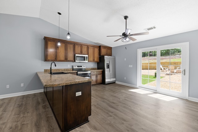 348 Bluegill Rd, Eatonton, GA 31024 - kitchen with appliances with stainless steel finishes, a peninsula, visible vents, ceiling fan, and a sink