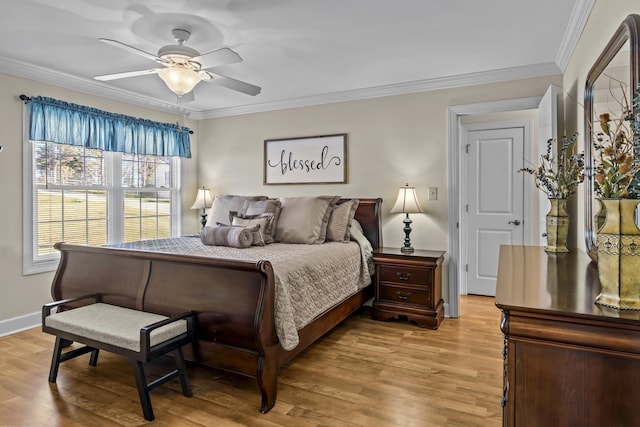 bedroom with crown molding, ceiling fan, and light wood-type flooring