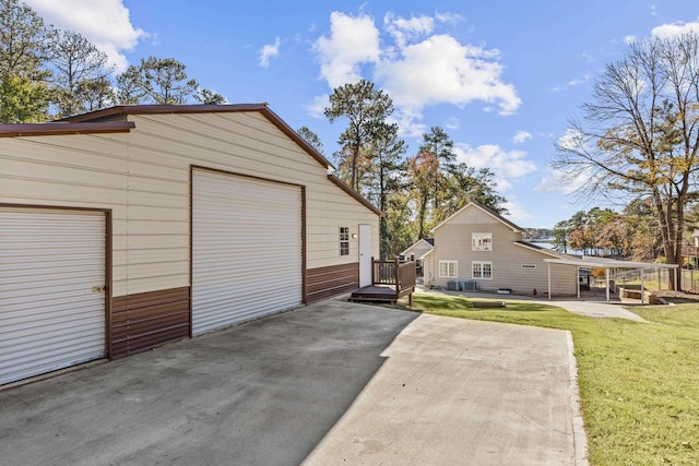 garage with a yard