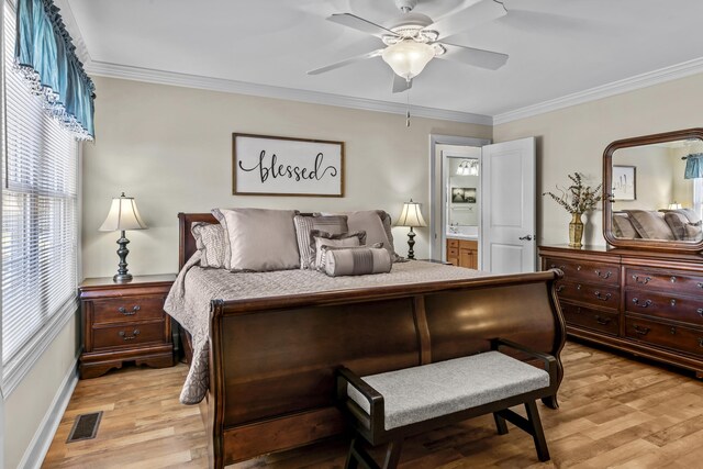 bedroom featuring ornamental molding, ceiling fan, and light hardwood / wood-style flooring