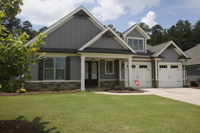 1060 Legend Dr, Greensboro, GA 30642 - craftsman house with board and batten siding, stone siding, and driveway