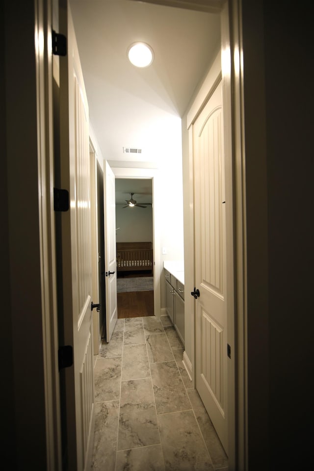 1060 Legend Dr, Greensboro, GA 30642 - corridor featuring light marble finish flooring