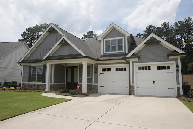 1060 Legend Dr, Greensboro, GA 30642 - craftsman inspired home with board and batten siding, concrete driveway, a front yard, and a shingled roof