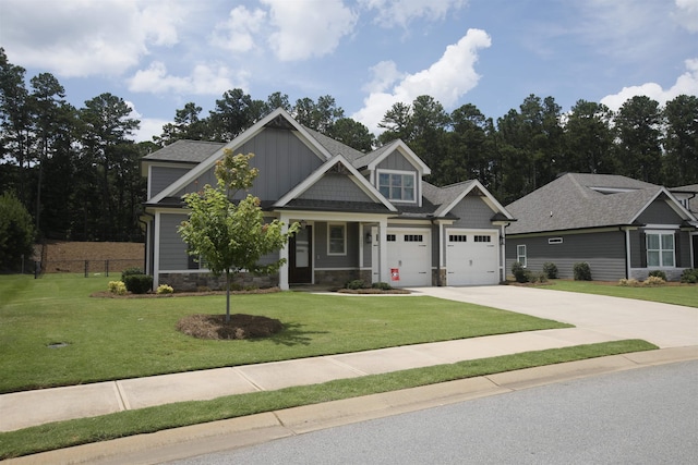 1060 Legend Dr, Greensboro, GA 30642 - craftsman-style home featuring driveway, stone siding, and an attached garage