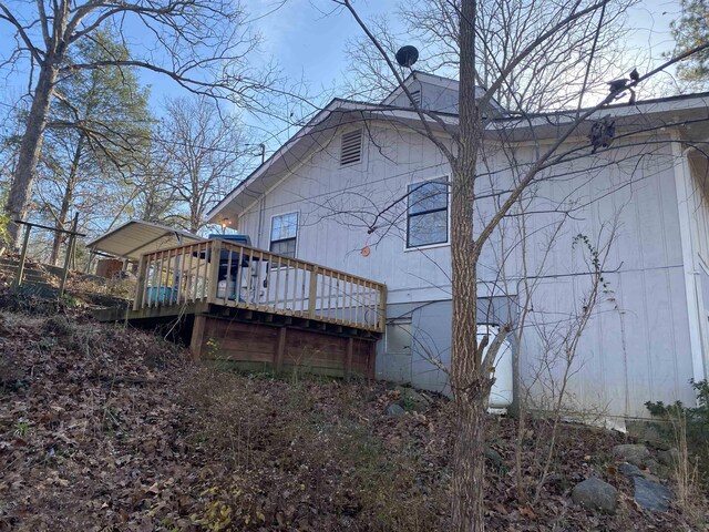 rear view of house with a deck