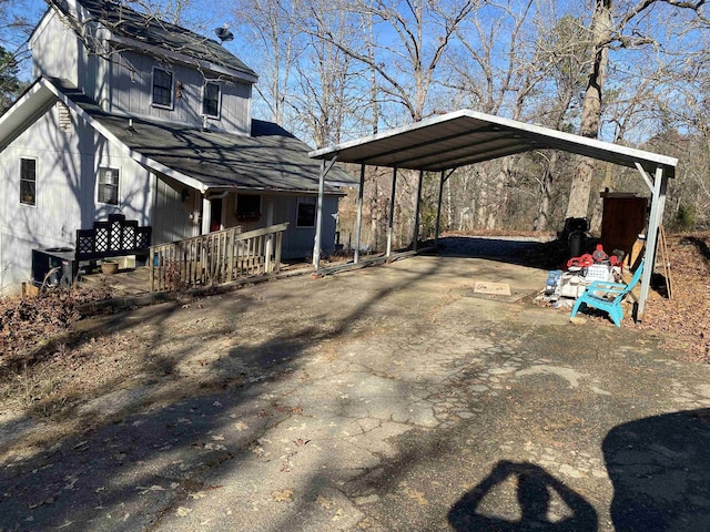 view of property exterior featuring a carport