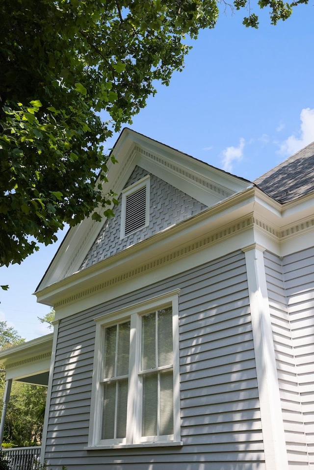 406 Madison Ave, Eatonton, GA 31024 - view of side of property featuring roof with shingles