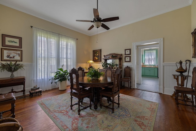 406 Madison Ave, Eatonton, GA 31024 - dining room with ceiling fan, wainscoting, ornamental molding, and wood finished floors