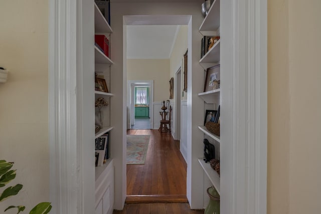 406 Madison Ave, Eatonton, GA 31024 - corridor featuring dark wood finished floors and ornamental molding