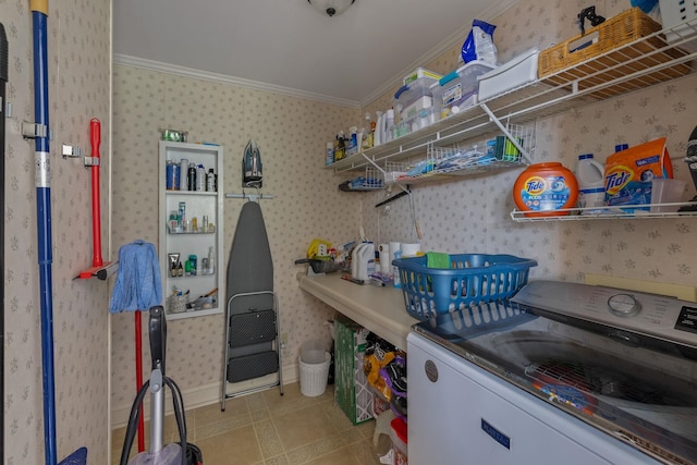 406 Madison Ave, Eatonton, GA 31024 - washroom with wallpapered walls, washer / clothes dryer, and ornamental molding