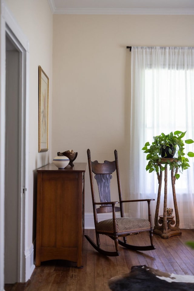 406 Madison Ave, Eatonton, GA 31024 - sitting room featuring hardwood / wood-style floors and crown molding