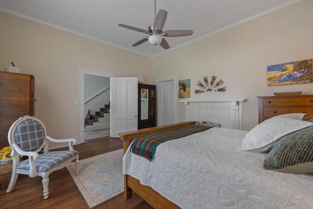 406 Madison Ave, Eatonton, GA 31024 - bedroom with crown molding, wood finished floors, baseboards, and ceiling fan