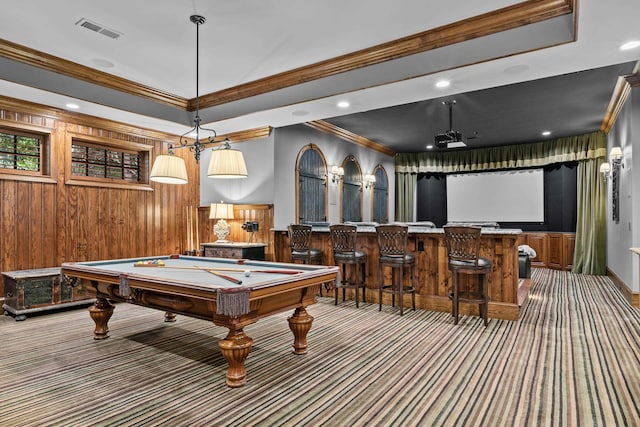 playroom featuring indoor bar, billiards, carpet floors, ornamental molding, and wood walls