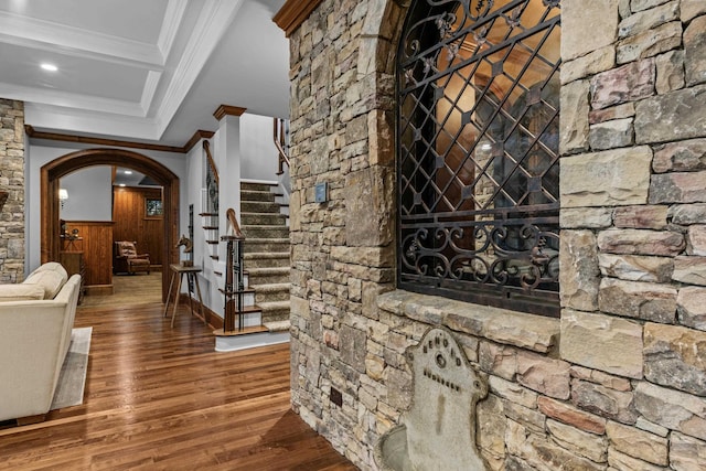 interior space with crown molding and dark hardwood / wood-style floors