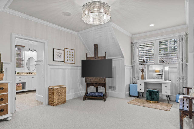 carpeted living room with ornamental molding