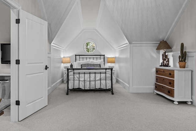 carpeted bedroom featuring vaulted ceiling