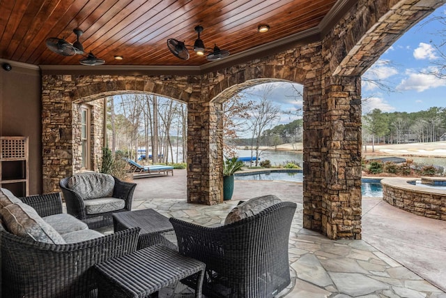 view of patio with a water view, ceiling fan, a swimming pool with hot tub, and an outdoor living space