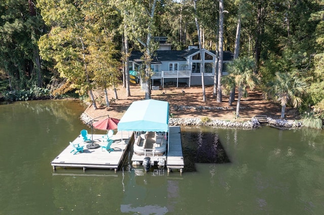 dock area featuring a water view