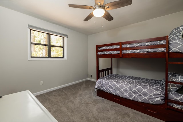 unfurnished bedroom with carpet floors and ceiling fan