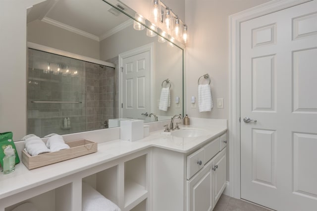bathroom with vanity, tile patterned flooring, crown molding, and walk in shower