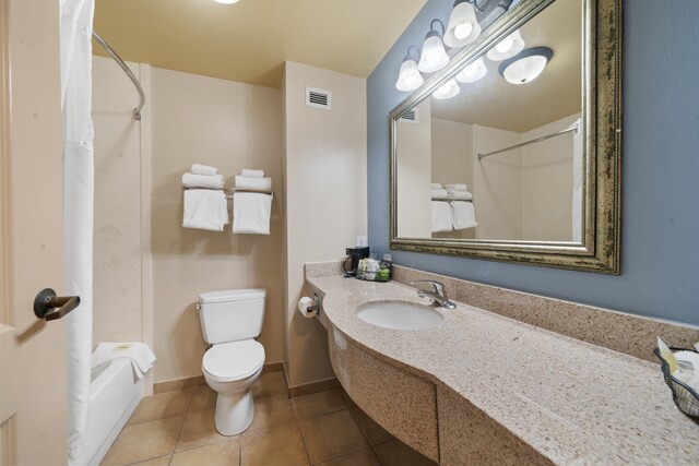 full bathroom featuring tile patterned flooring, sink, shower / bath combination with curtain, and toilet