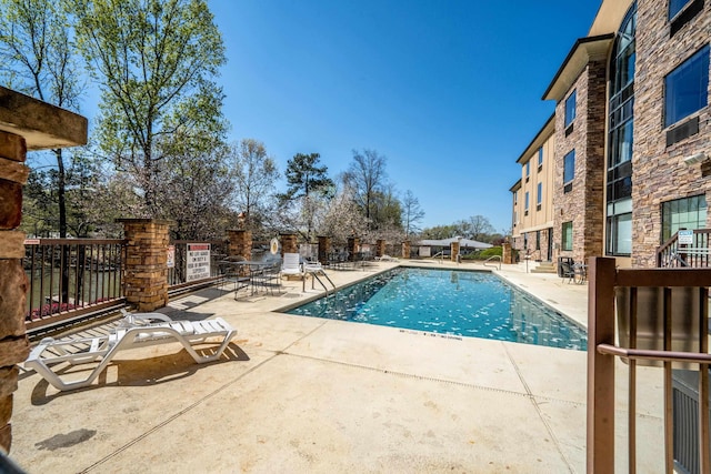 view of pool with a patio