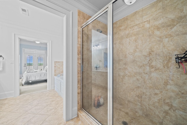 112-UNIT309 Indian Summer Path, Eatonton, GA 31024 - ensuite bathroom featuring ornamental molding, a stall shower, and tile patterned floors