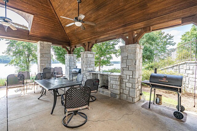 112-UNIT309 Indian Summer Path, Eatonton, GA 31024 - view of patio / terrace featuring ceiling fan, a grill, outdoor dining space, and a water view
